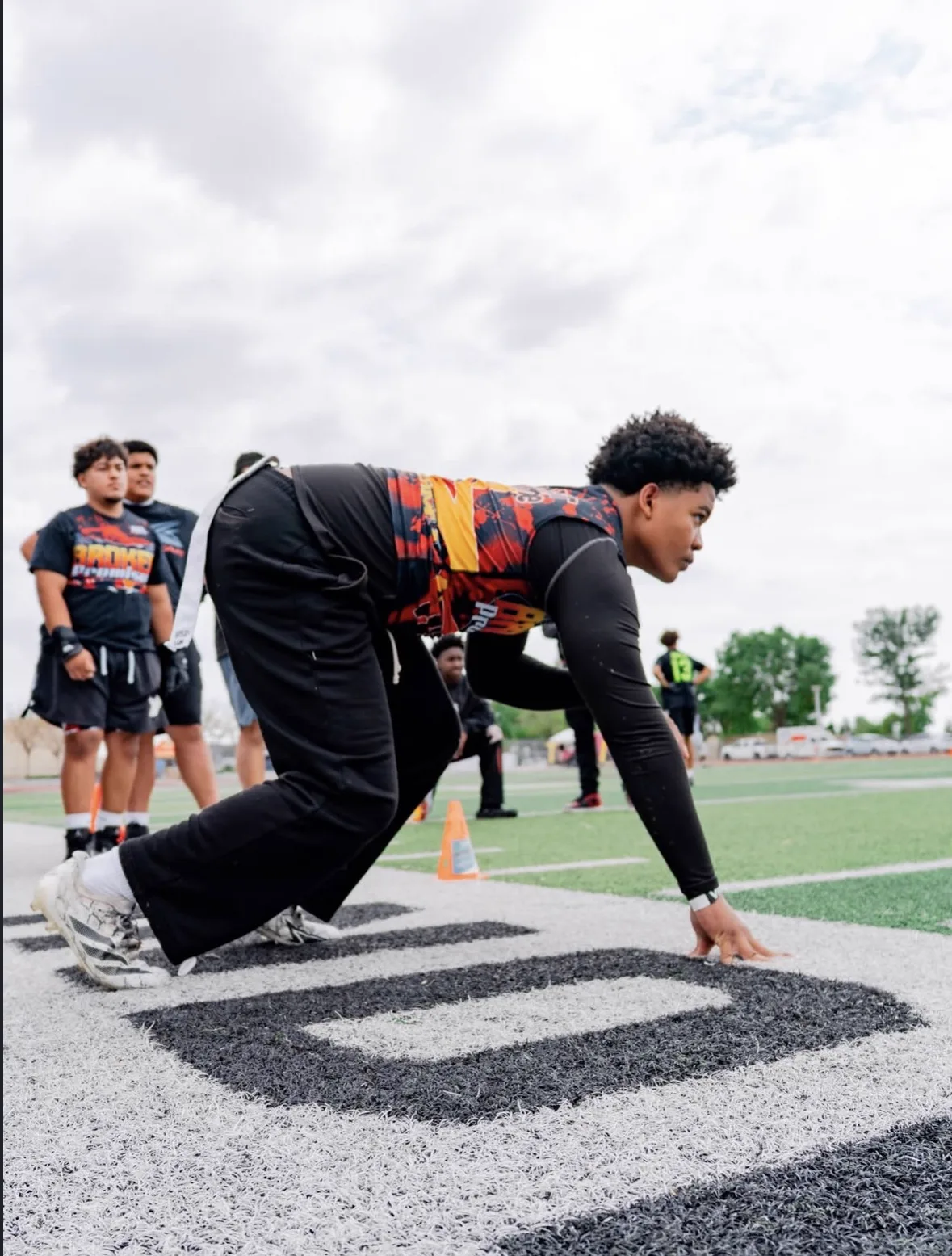 Coach Isaac on the field